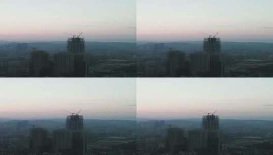 城市航拍清晨迷雾日出竖屏航拍高清在线视频素材下载