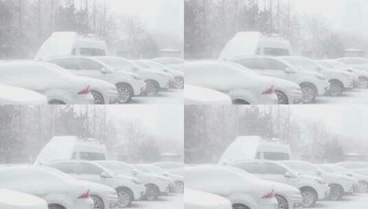 雪花落在停车场的汽车上高清在线视频素材下载