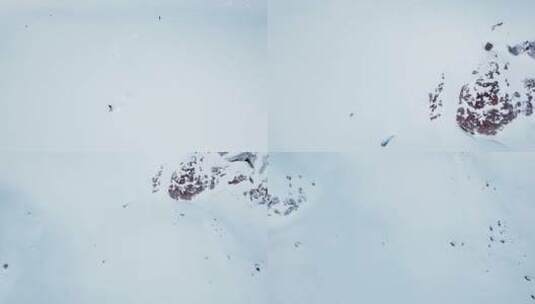 航拍游客在户外雪山滑雪高清在线视频素材下载