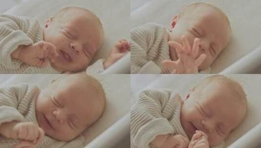 婴儿新生儿面部特写，熟睡的婴儿高清在线视频素材下载