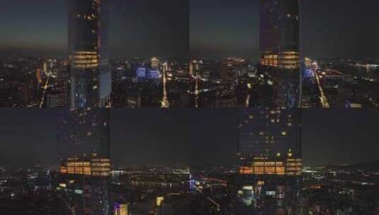 航拍江苏南京鼓楼区紫峰大厦城市夜景景观高清在线视频素材下载