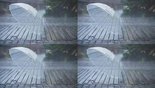 治愈意境雨景、细雨中的透明雨伞高清在线视频素材下载
