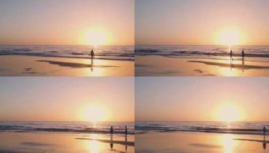 海边日落情侣在海边的剪影高清在线视频素材下载