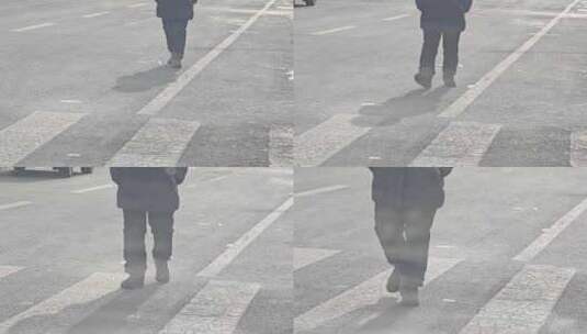 冬季穿着棉袄一个人走在大街上高清在线视频素材下载