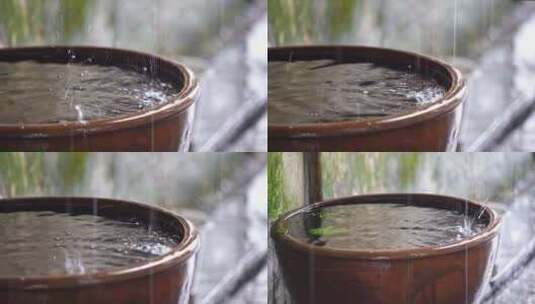 雨水滴在水缸中高清在线视频素材下载