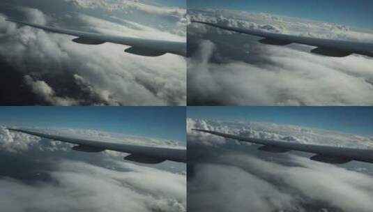 飞机在云朵上空飞行高清在线视频素材下载