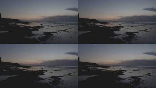 夕阳下的海滨人群剪影高清在线视频素材下载