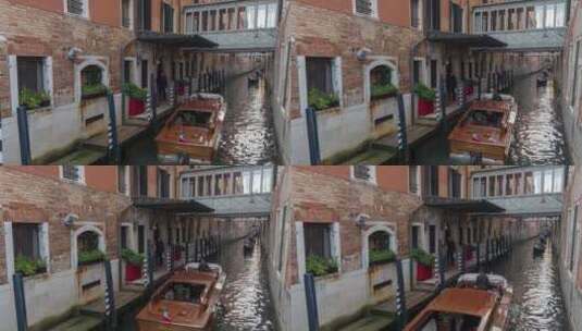 市民驾驶小船在威尼斯河道行驶高清在线视频素材下载
