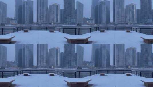 城市下雪高楼大厦河流高清在线视频素材下载