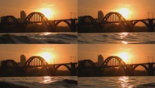 城市河流上的日落高清在线视频素材下载