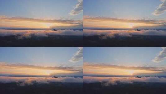 云雾之上，夕阳从云缝中露出来高清在线视频素材下载
