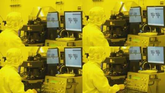 芯片制造黄色环境下工程师进行测试实验高清在线视频素材下载