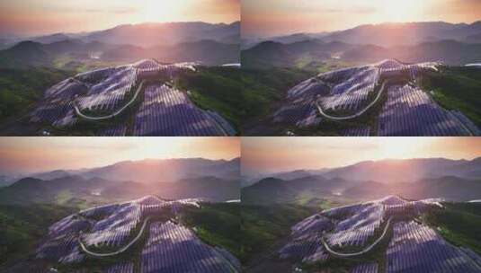 新能源太阳能光伏发电站夕阳下山坡航拍高清在线视频素材下载