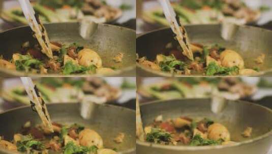 翻炒蔬菜的特写镜头高清在线视频素材下载