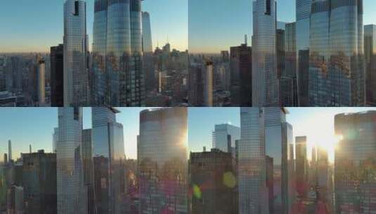 城市航拍阳光照射过摩天大楼之间高端地产高清在线视频素材下载