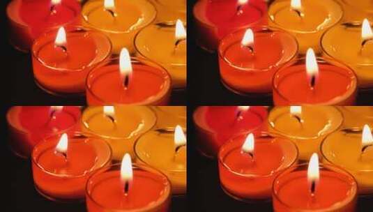 红色的蜡烛 燃烧的蜡烛 烛光特写高清在线视频素材下载
