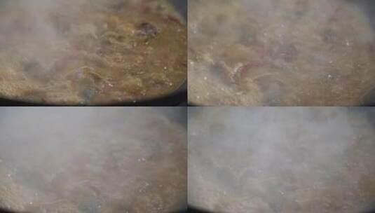 锅里煮的热气腾腾的美食高清在线视频素材下载
