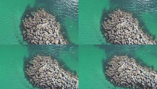海里裸露的石堆高清在线视频素材下载