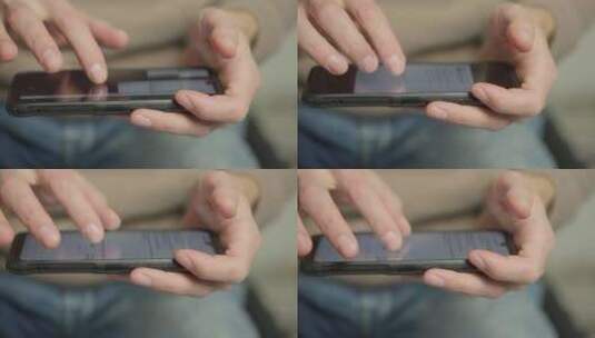 一个男人的手指触摸显示器在手机上滚动页面高清在线视频素材下载