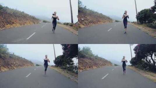 女人沿着公路慢跑高清在线视频素材下载
