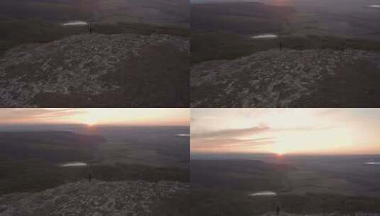 一个人从山顶看日落高清在线视频素材下载