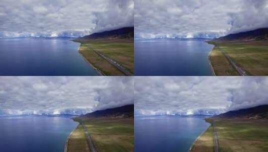 赛里木湖绝美湖边公路风光航拍高清在线视频素材下载