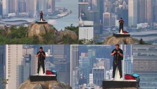 站在香港宝马山顶的中年男人高清在线视频素材下载
