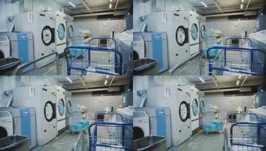 大型干洗店洗衣机洗衣服高清在线视频素材下载