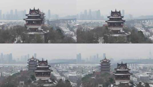 武汉航拍黄鹤楼古建筑雪景下雪红楼长江大桥高清在线视频素材下载