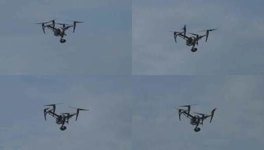 慢镜头升格天空悬停的数码设备无人机航拍器高清在线视频素材下载