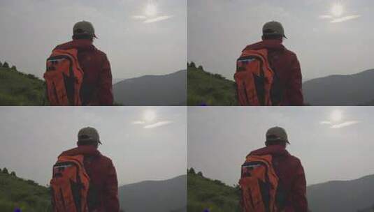 男子户外背背包眺望远方高清在线视频素材下载